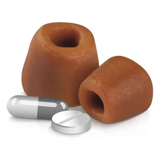 2 royal canin pill assist treats with medication on a white background 