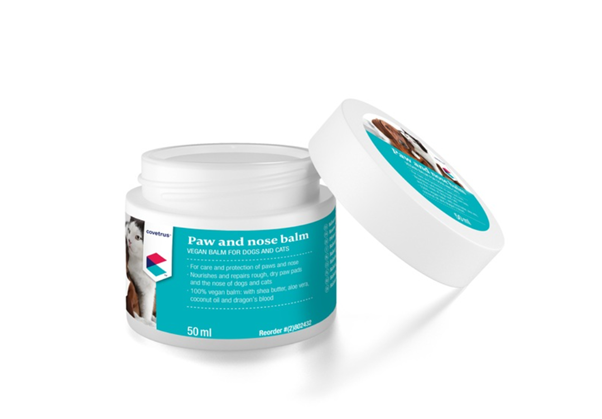 Paw and nose balm container with lid on a white background