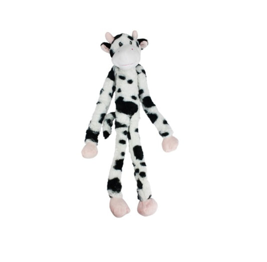 Plush cow dog toy with black spots on a white background