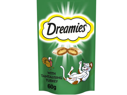 Dreamies cat food packaging with a green background and cartoon cat and turkey illustration.
