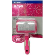 Pink slicker brush with packaging featuring pink design