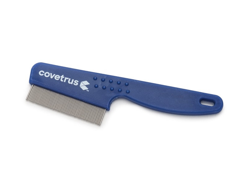 Blue flea comb with metal teeth on a white background, branded 'covetrus'.