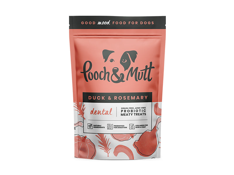 Dog treat package labeled 'Pooch & Mutt' with duck and rosemary flavor on a white background