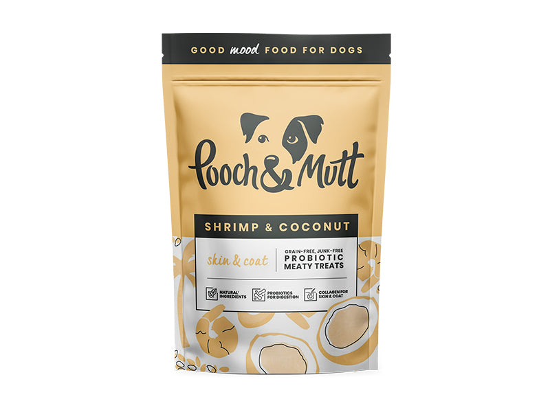 Dog treat package labeled 'Pooch & Mutt' with shrimp and coconut flavor on a white background