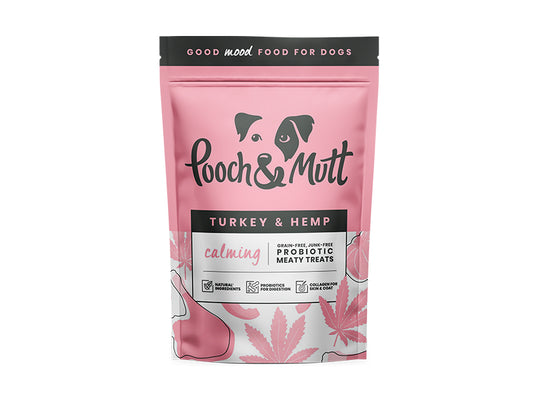 Pink package of Pooch & Mutt dog treats with black text on a white background